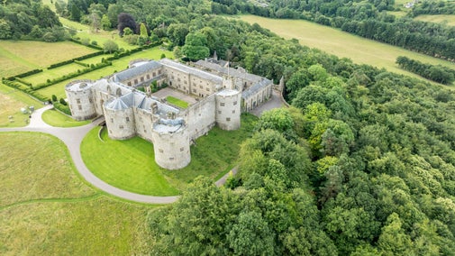 A view across the garden towards the castle at Chirk Castle in Wrexham